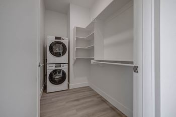 A laundry room with a washer and dryer.